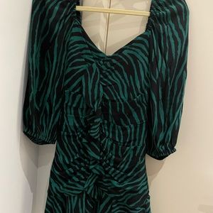 Green and black zebra print mini dress